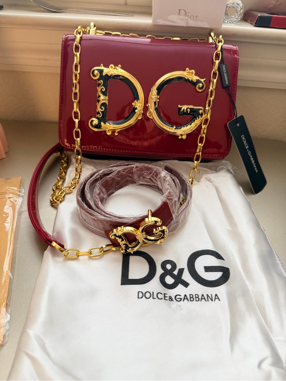 New shiny deep Red  DG Logo Crossbody bag & matching belt with gold hardware